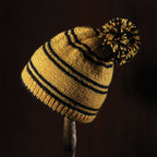 Productafbeelding Hufflepuff Pompon Muts Breiset - Harry Potter
