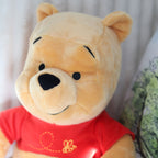 Productafbeelding Winnie de Poeh - Zittende pluche figuur