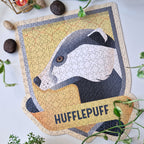 Productafbeelding Harry Potter - Hufflepuff Crest Puzzel in toverdrankfles met kurkdop