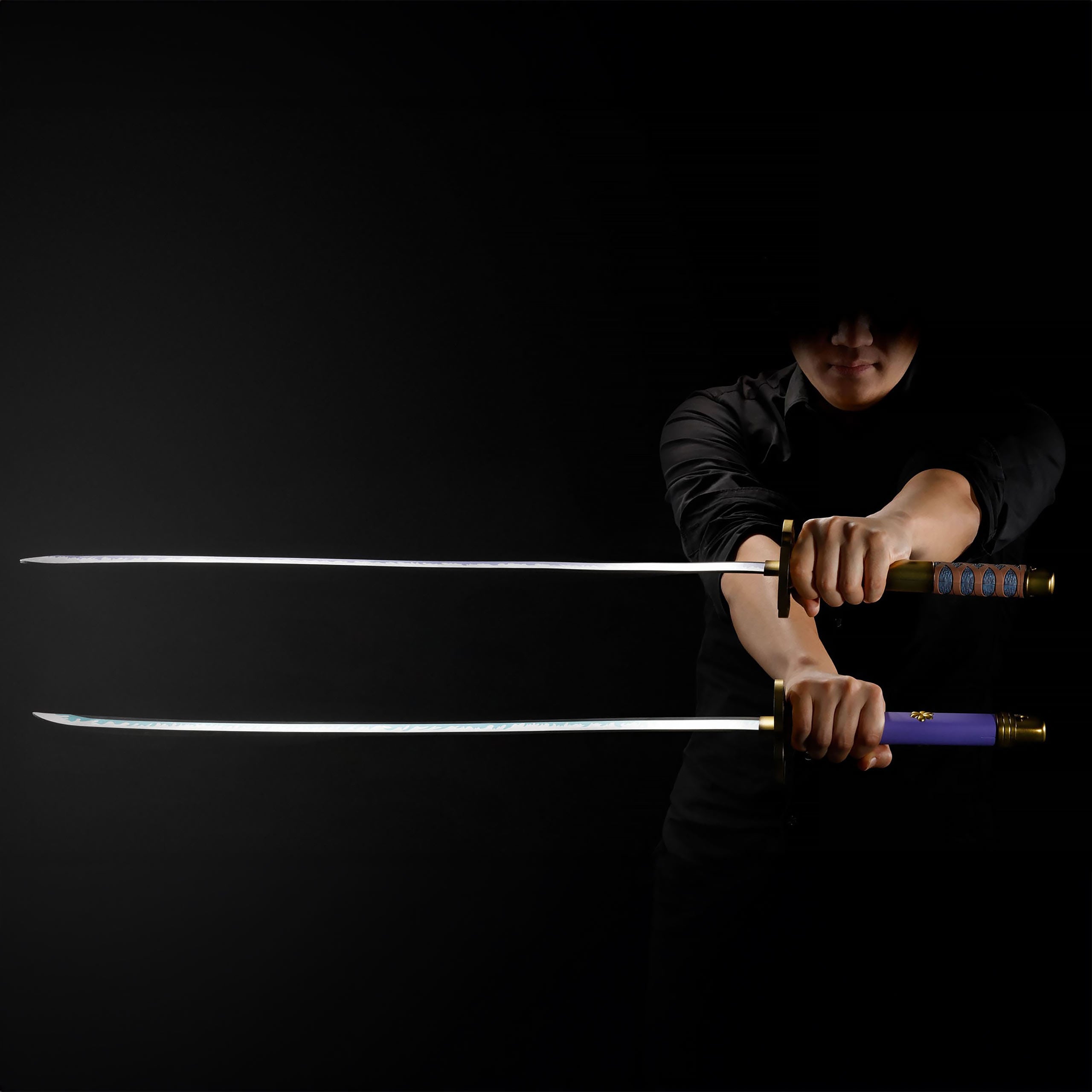 Productafbeelding One Piece - Roronoa Zoro zwaarden replica set van 3